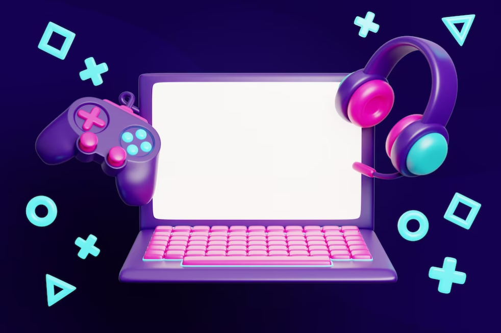 gaming tools and laptop on dark purple background
