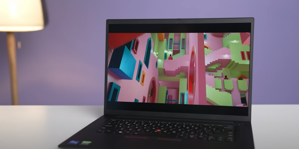 A colorful background displayed on the front view of a Lenovo ThinkPad X1 Extreme Gen 4 laptop